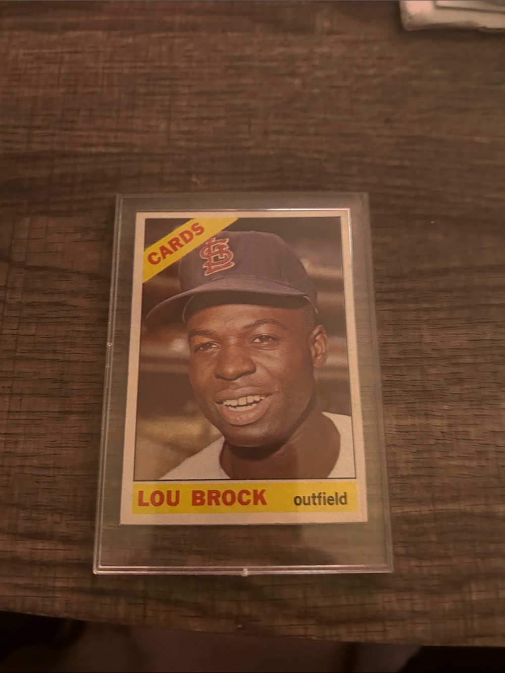 Lou Brock Baseball Card in Clear Protective Sleeve - Brown/Yellow